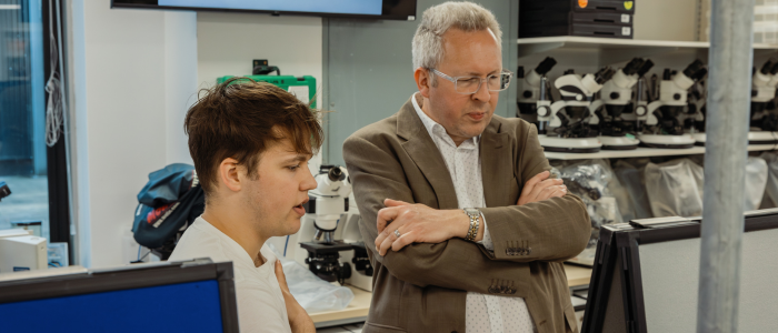Dr Andrew Pridmore with student at the University of Leeds