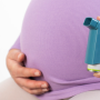 Pregnant woman with inhaler